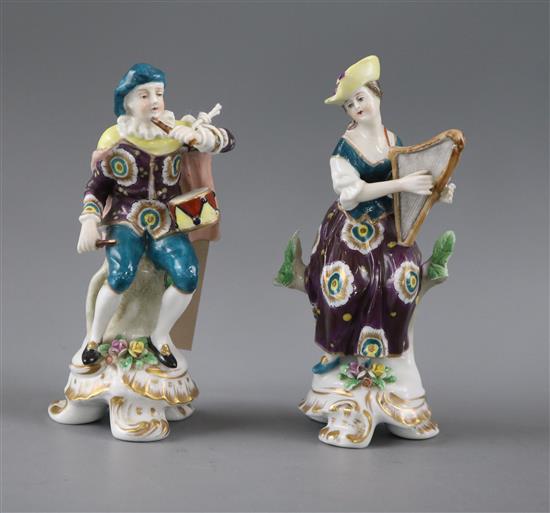 A pair of Samson porcelain figures of musicians, he playing the fife and drum, she the harp, pseudo Chelsea Anchor marks, 14cm high